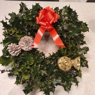 Decorated holly wreath